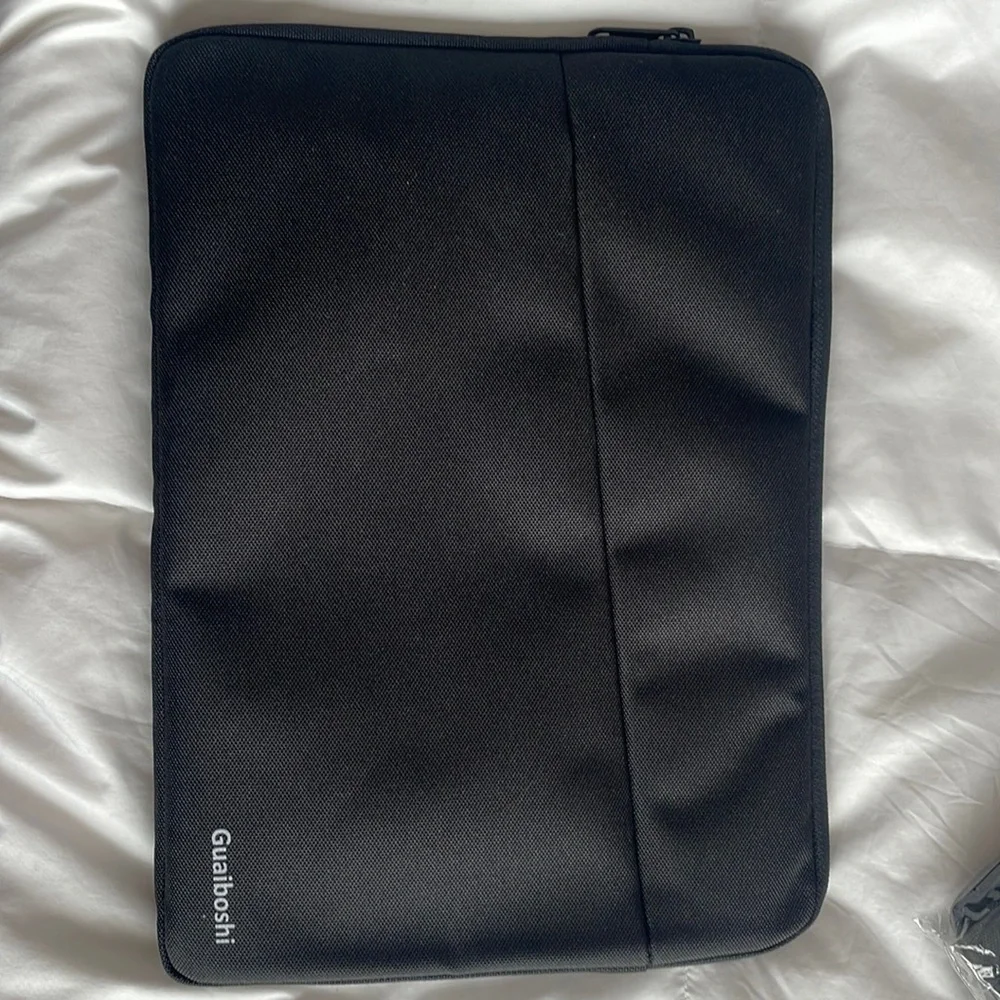 Tablet case. New in package. Black. Guaiboshi